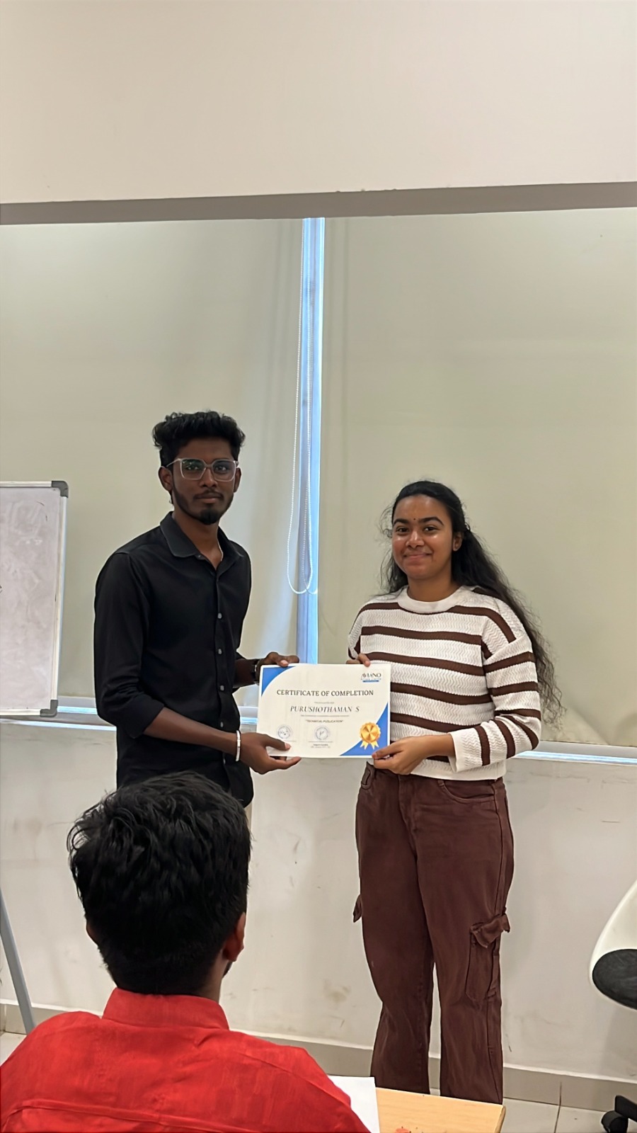 Aviano learner receiving a course completion certificate 1