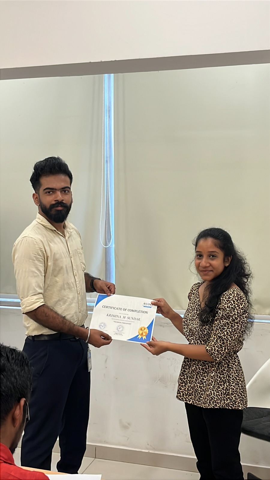Aviano learner receiving a course completion certificate 6