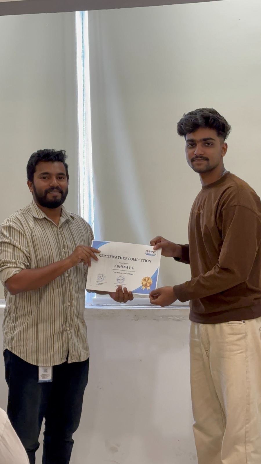 Aviano learner receiving a course completion certificate 8