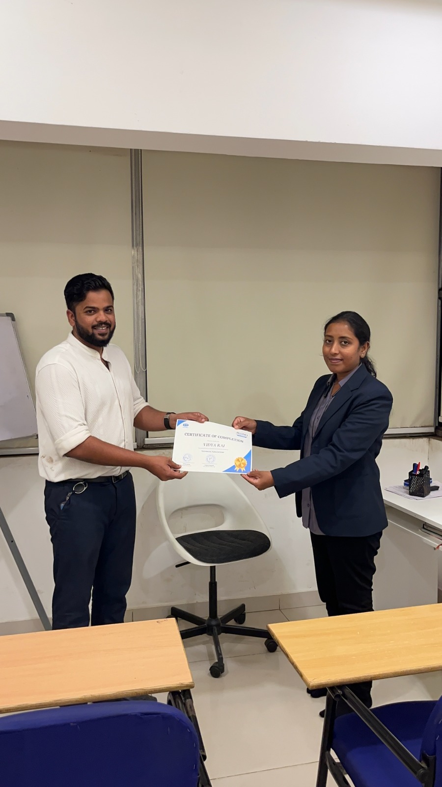 Aviano learner receiving a course completion certificate 18