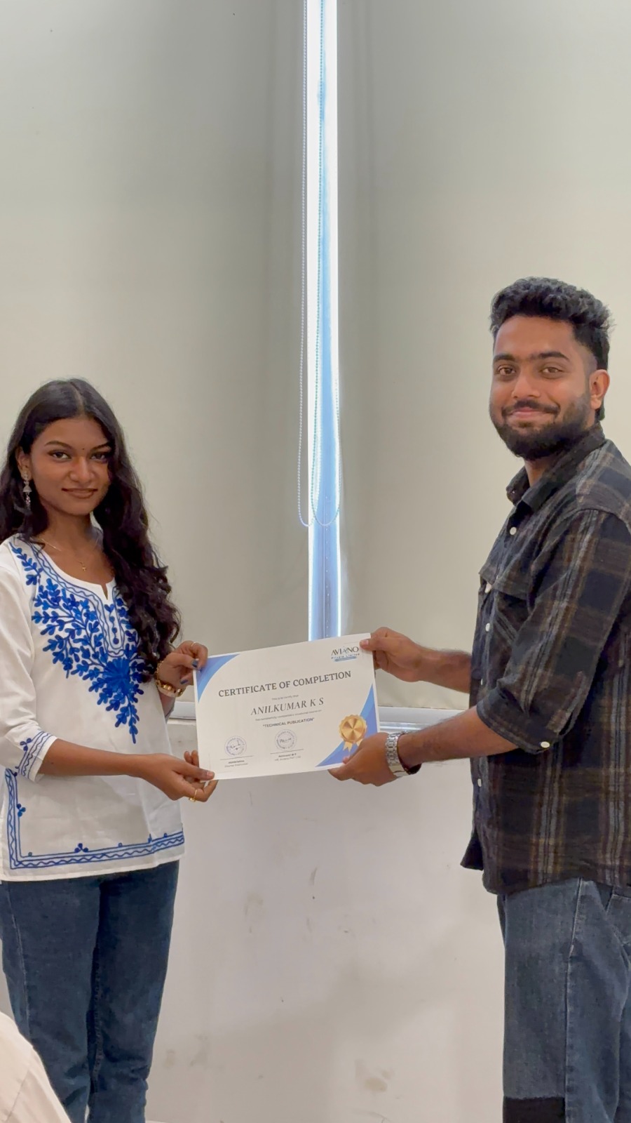 Aviano learner receiving a course completion certificate 10