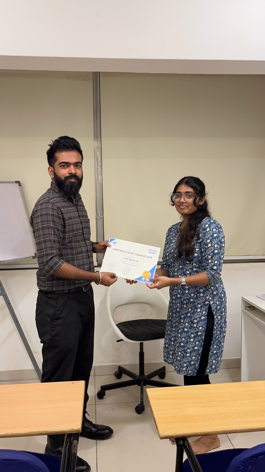 Aviano learner receiving a course completion certificate 15